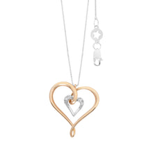 Carica l'immagine nel visualizzatore di Gallery, collana con pendente a forma di cuore in oro bianco e rosa con diamanti incastonati