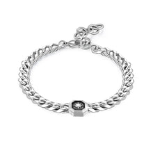 Carica l'immagine nel visualizzatore di Gallery, bracciale da uomo in acciaio lucido e smalto nero con elemento ottagonale con decoro a rosa dei venti di sagapo gioielli