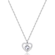 Carica l'immagine nel visualizzatore di Gallery, Collana con pendente a forma di cuore in Acciaio con cristallo al centro
