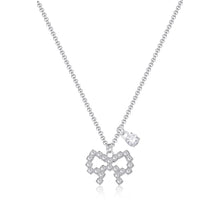 Carica l'immagine nel visualizzatore di Gallery, Collana con pendenti a forma di fiocco e punto luce con cristalli bianchi In acciaio Lucido color argento.
