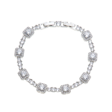 bracciale tipo tennis tempestato di cristalli bianchi montati su metallo rodiato