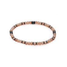 Carica l'immagine nel visualizzatore di Gallery, Bracciale elastico con perle di vetro di colore marrone ed anellini in acciaio placcati di nero
