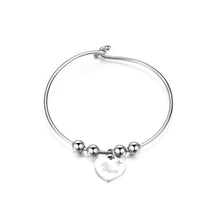 Carica l'immagine nel visualizzatore di Gallery, Bracciale Rigido S'AGAPò Be My Always in Acciaio con pendente a forma di Cuore su cui è inciso "Be Happy" ed "Happiness".
