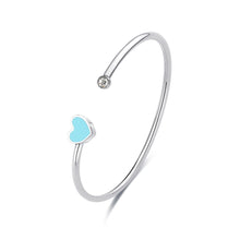 Carica l'immagine nel visualizzatore di Gallery, bracciale rigido in acciaio lucido con cristallo bianco e smalto color turchese di sagapò click

