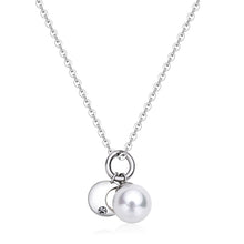 Carica l'immagine nel visualizzatore di Gallery, Collana in acciaio con Perla e luna con cristallo
