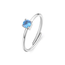 Carica l'immagine nel visualizzatore di Gallery, anello sottile con pietra di colore celeste montata su acciaio lucido color argento
