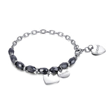 Carica l'immagine nel visualizzatore di Gallery, Bracciale in acciaio con pendente a cuore e onice sfaccettato
