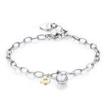 Carica l'immagine nel visualizzatore di Gallery, bracciale con cristallo a forma di goccia in acciaio lucido color argento e charm con stella dorata
